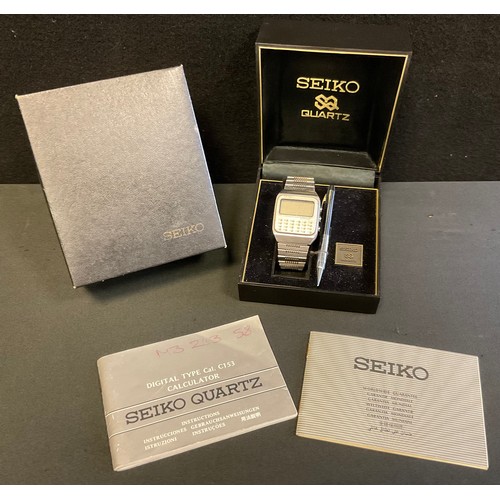 381 - A 1970's Seiko Quartz Digital calculator watch, C153,  in original box with paperwork and pen