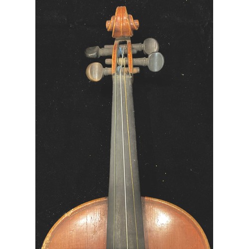 44 - A violin, the two-piece back 36cm long excluding button, paper label Copy of Nicolaus Fr Amati Fecit... 