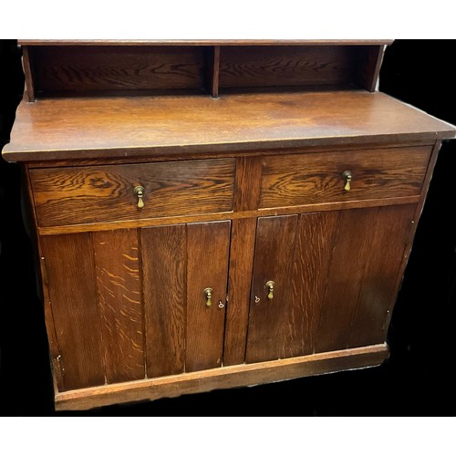 38 - An early 20th century oak narrow sideboard / cupboard, 100cm tall x 111cm wide x 51cm deep, c.1910.