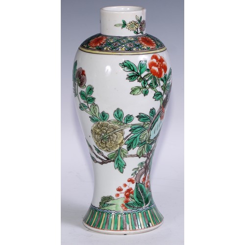 63 - A Chinese famille verte baluster vase, painted in polychrome with birds amongst chrysanthemums and p... 