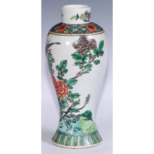 63 - A Chinese famille verte baluster vase, painted in polychrome with birds amongst chrysanthemums and p... 