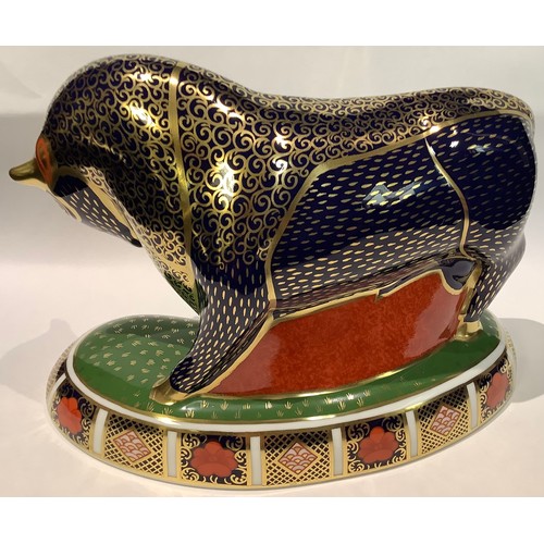 67 - A Royal Crown Derby paperweight, Grecian Bull, gold stopper, printed marks in red, boxed