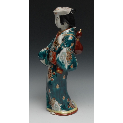 100 - A Japanese porcelain figure, of a geisha, decorated in polychrome, 37cm high, Meiji/Taisho period