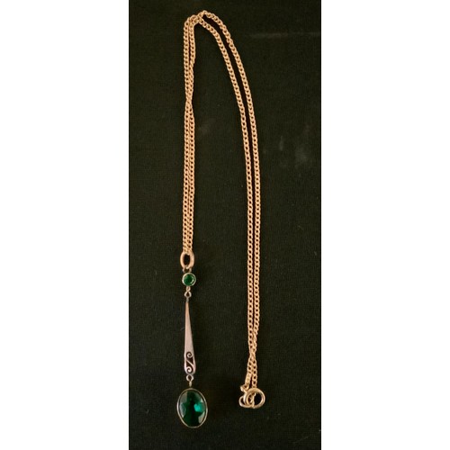 396 - A 9ct gold pendant neck lace, set with two facetted green glass stones, 4.7g gross