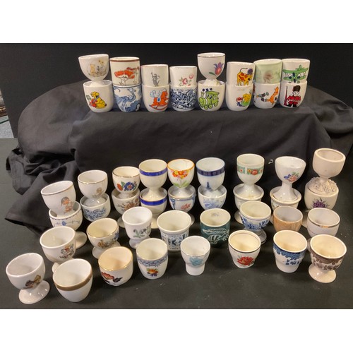 234 - Egg cups - Poole; Delft; Royal Doulton, 'Fieldflower'; Hornsea; Crown Staffordshire etc