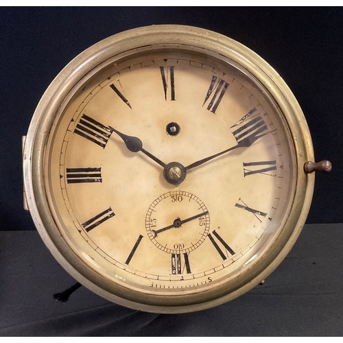 295 - A brass ships wall clock,  Roman numerals, subsidiary seconds dial, chain fusee movement,  24.5cm di... 