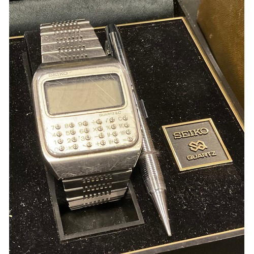 381 - A 1970's Seiko Quartz Digital calculator watch, C153,  in original box with paperwork and pen