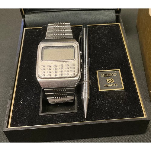 381 - A 1970's Seiko Quartz Digital calculator watch, C153,  in original box with paperwork and pen