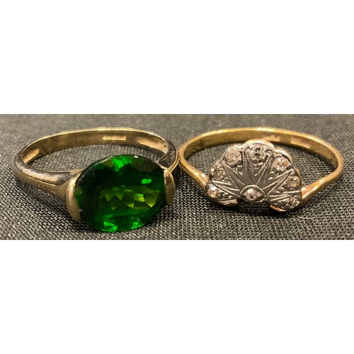 405 - A diamond chip ring, mounted in a fan, 18ct gold shank;   a green stone, 9ct gold shank