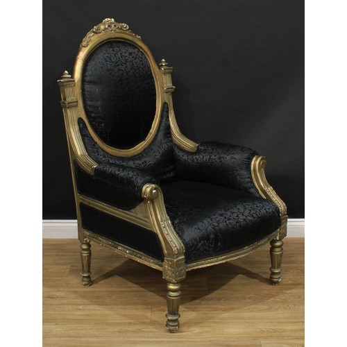 103 - A pair of bold Louis XVI design bergère à la reine or throne-form armchairs, stuffed-over upholstery... 