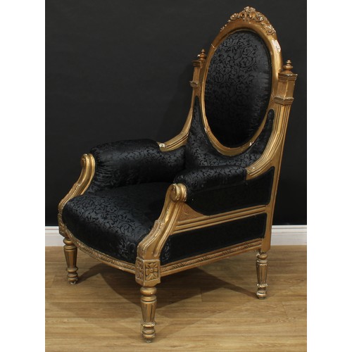 103 - A pair of bold Louis XVI design bergère à la reine or throne-form armchairs, stuffed-over upholstery... 