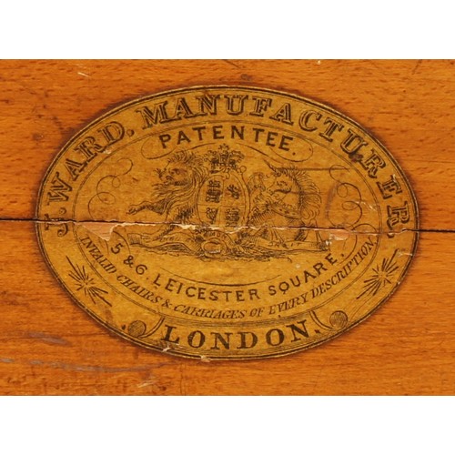 108 - A Victorian Alderman's Patent Derby chair, by J. Ward, 5 & 6 Leicester Square, London, scroll arms, ... 