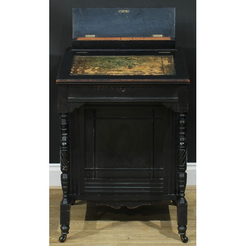 112 - A late Victorian Aesthetic Movement ebonised Davenport desk, hinged rectangular superstructure enclo... 