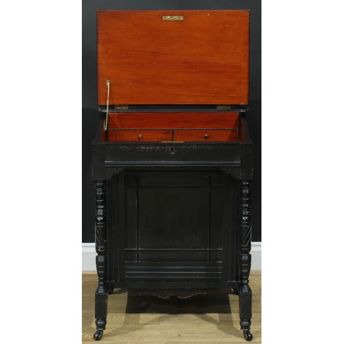 112 - A late Victorian Aesthetic Movement ebonised Davenport desk, hinged rectangular superstructure enclo... 