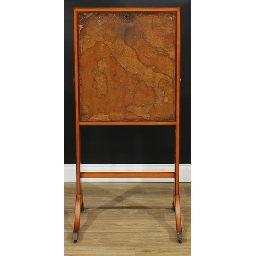 114 - An unusual 19th century satinwood folding desk, the fall front applied with a linen map of Italy, en... 