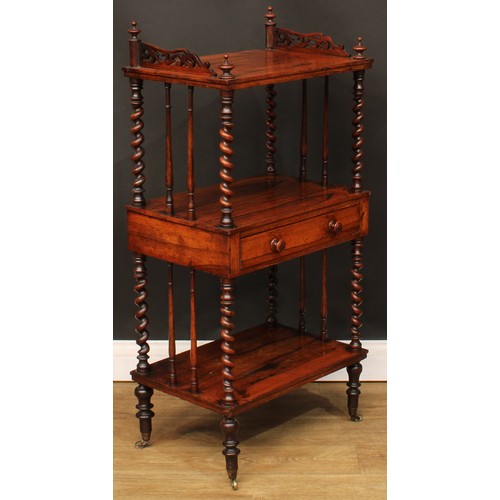 110A - A Victorian rosewood three-tier whatnot, the central plateau with a frieze drawer, spirally turned s... 