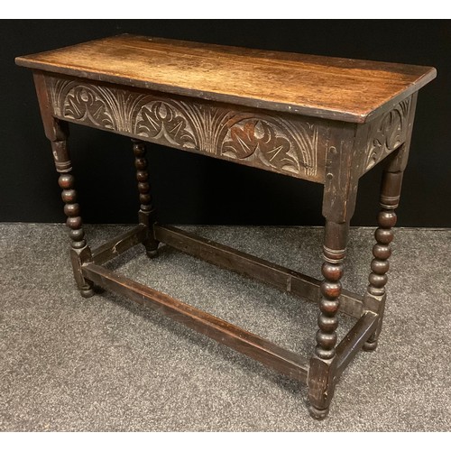 19 - A George III mahogany tilt top side table, rounded rectangular top, turned column, tripod feet, 73cm... 