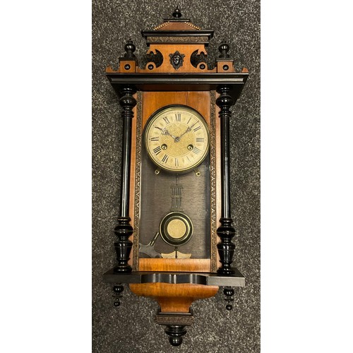 66 - A Junghans small Vienna wall clock, walnut and ebonised wood case, painted brass face with Roman num... 