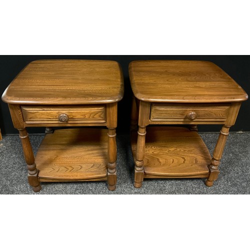 79 - A pair of Ercol Elm side tables, drawer to frieze, turned legs, 57cm tall x 47.5cm wide x 44.5cm dee... 