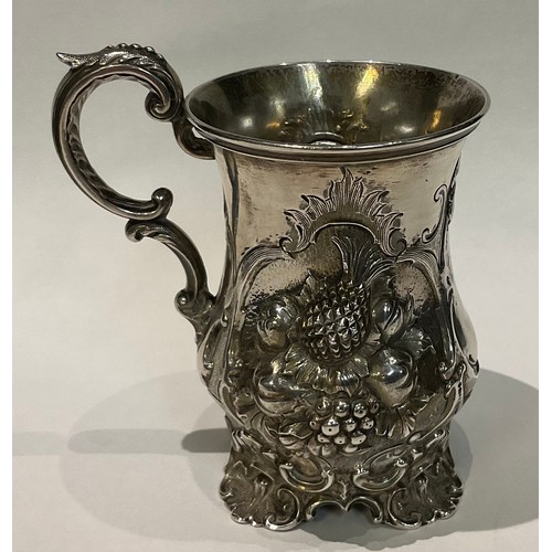 145 - A Victorian silver cup, deeply embossed with fruit including Apples, Pineapple, Grapes, George John ... 