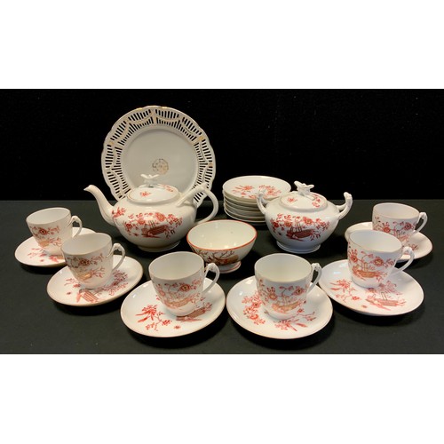 142 - A Japanese tea service, comprising six cups, plates, teapot, sugar bowl and cover, c.1900