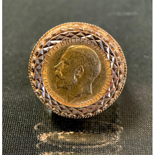 461 - A half sovereign signet ring, 1918, later 9ct gold shank, size N, 8.6g gross