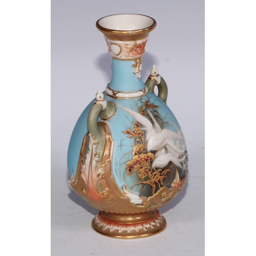 47 - A Royal Worcester ovoid vase, painted by Charles Baldwin, signed, with swans, on a turquoise ground,... 