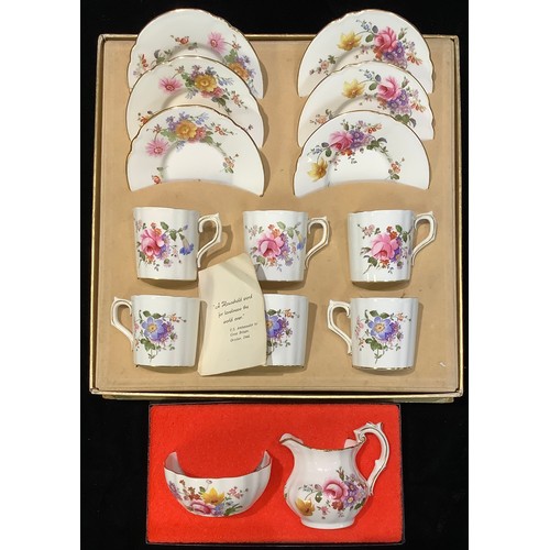 77 - A Royal Crown Derby Posie pattern coffee set for six, printed marks in green, original box; a Royal ... 