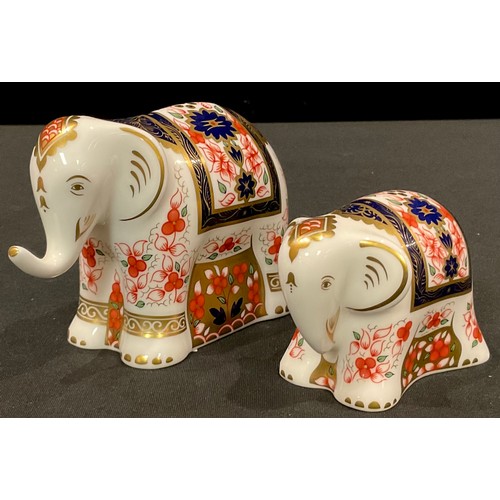 105 - A pair of Royal Crown Derby paperweights, Lucky Star, Imari elephant and Lucky Charm, Govier's exclu... 