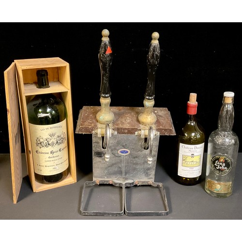 125 - Breweriana - a pair of Bass beer taps/pumps, mounted as one; a large 6 litre wine bottle, Chateau Ha... 