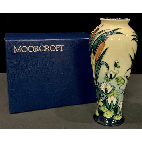 126 - A Moorcroft Lamia pattern slender inverted baluster vase, tube lined with lily pads and bulrushes, d... 