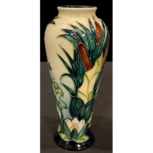 126 - A Moorcroft Lamia pattern slender inverted baluster vase, tube lined with lily pads and bulrushes, d... 