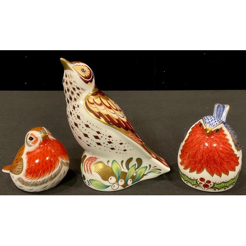 130 - A Royal Crown Derby paperweight, Christmas Mistle Thrush, gold stopper, printed marks; others, Chris... 