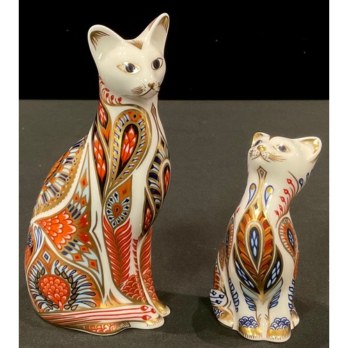 137 - A pair of Royal Crown Derby paperweights, Siamese Cat and Kitten, gold stoppers, printed marks