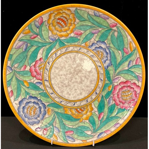 141 - A Charlotte Rhead Crown Ducal charger, tube lines with bright summer flowers, pattern number 4040, s... 