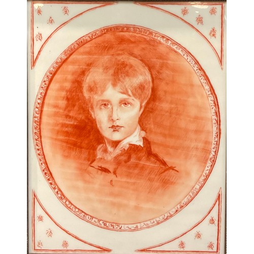 168 - A 19th century porcelain plaque, portrait of a young boy, 33cm x 26cm