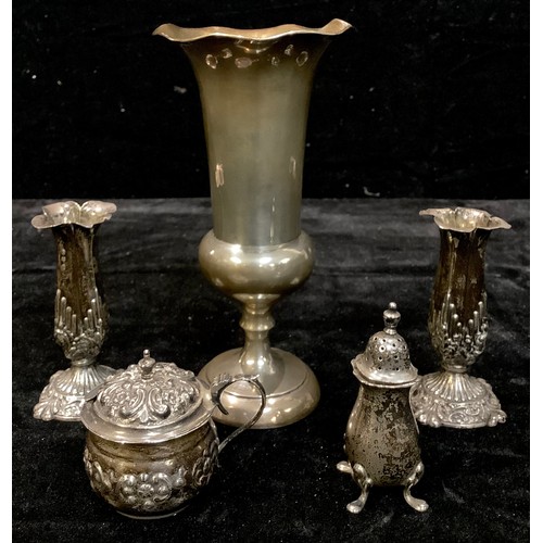 192 - A silver vase, wavy edge, waisted base, Birmingham 1907; a silver salt; a silver caster; a pair of s... 