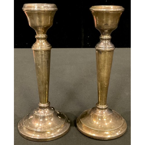 196 - A pair of Elizabeth II silver candlesticks, 15.5cm high, Birmingham 1972