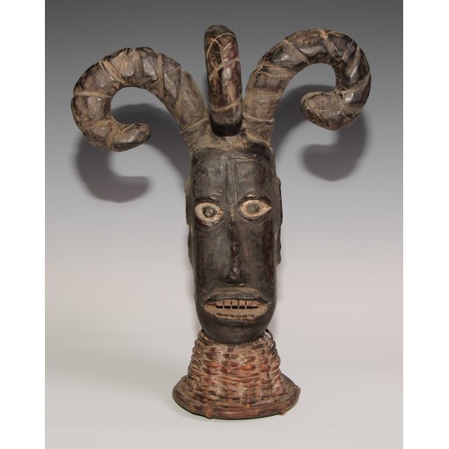 714 - Decorative Tribal Art and the Eclectic Interior - an Ekoi (Ejagham) headdress or crest mask, hide cl... 