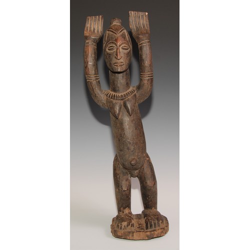 710 - Decorative Tribal Art and the Eclectic Interior - a Dogon Tellem altar figure, typically posed with ... 