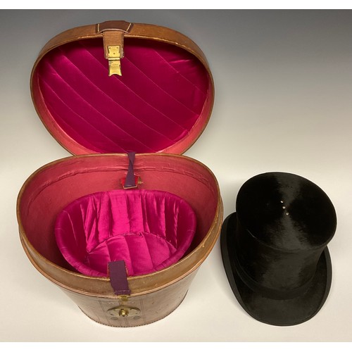 113 - A 19th century leather top hat box, brass fittings, 35cm wide, c.1880; enclosing a silk top hat, by ... 