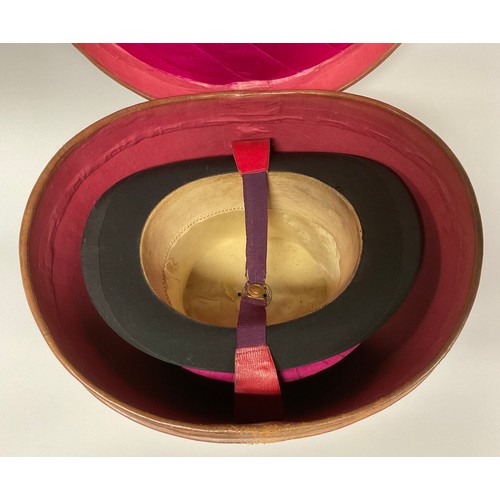 113 - A 19th century leather top hat box, brass fittings, 35cm wide, c.1880; enclosing a silk top hat, by ... 