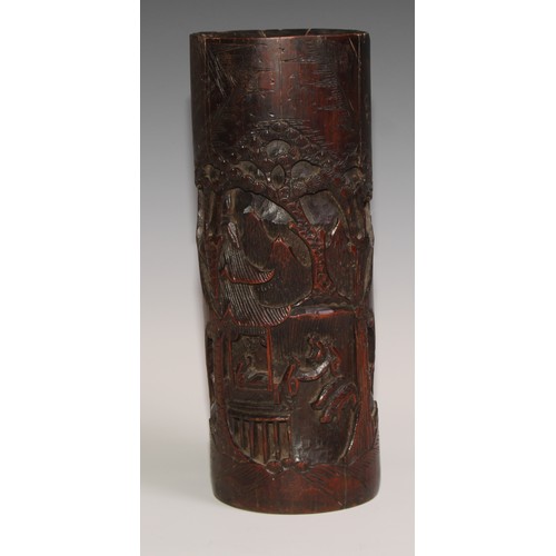 64 - A Chinese bamboo bitong brush pot, carved in the Cantonese manner with figures and blossoming prunus... 