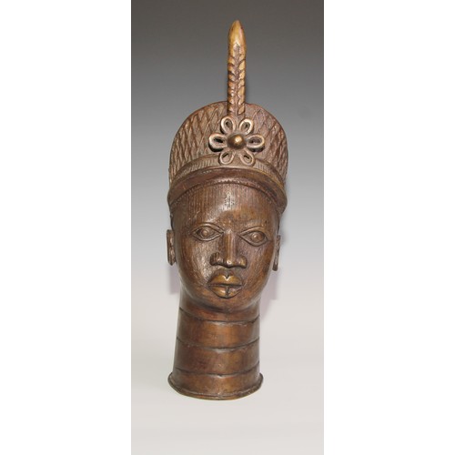 715 - Decorative Tribal Art and the Eclectic Interior- a bronze, cast as the head of an Oba or figure of t... 