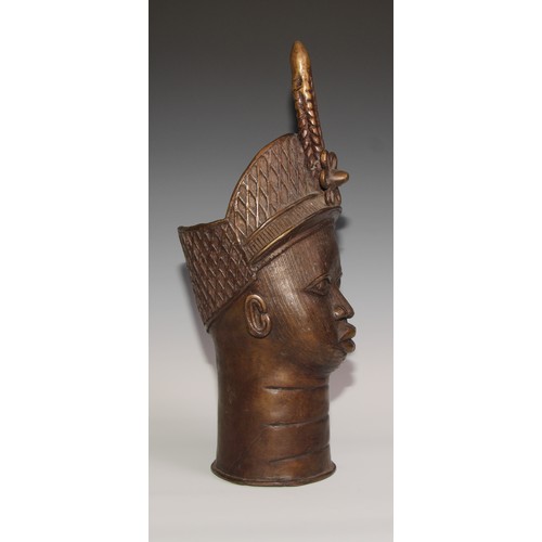 715 - Decorative Tribal Art and the Eclectic Interior- a bronze, cast as the head of an Oba or figure of t... 