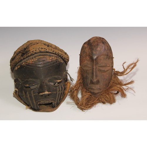 709 - Decorative Tribal Art and the Eclectic Interior - a Chokwe mask, stylised features, 25cm long, Angol... 