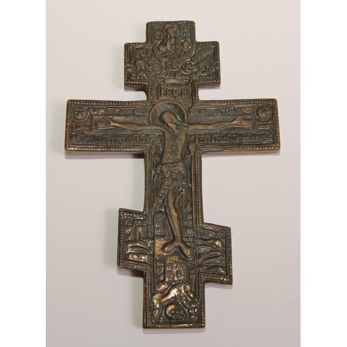 445 - A Russian Orthodox cross, of  Slavonic form, 15cm long; others (3)