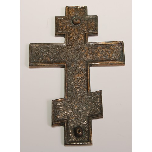 445 - A Russian Orthodox cross, of  Slavonic form, 15cm long; others (3)