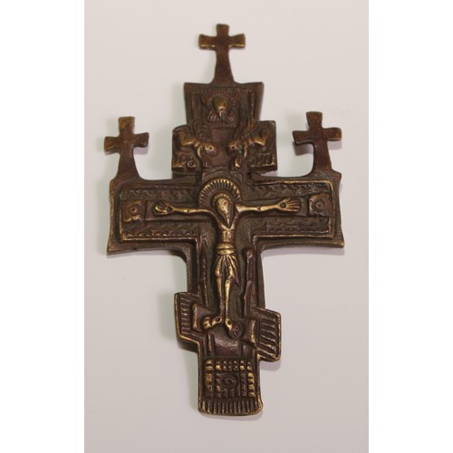 445 - A Russian Orthodox cross, of  Slavonic form, 15cm long; others (3)