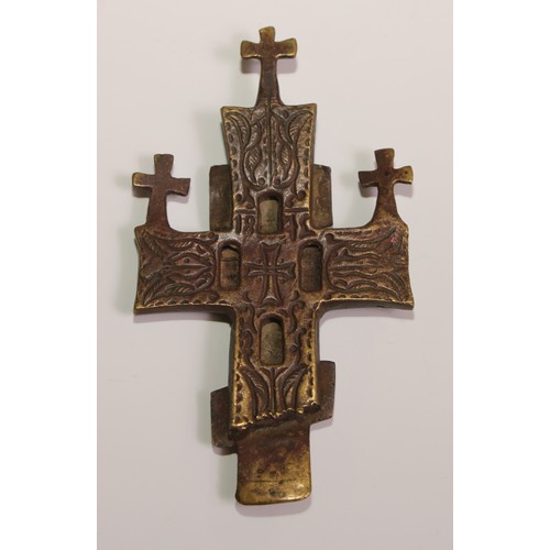 445 - A Russian Orthodox cross, of  Slavonic form, 15cm long; others (3)